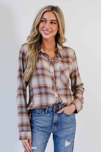 taupe Plaid Flannel tucked into denim