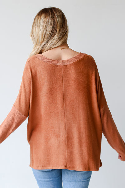 rust brushed knit tops
