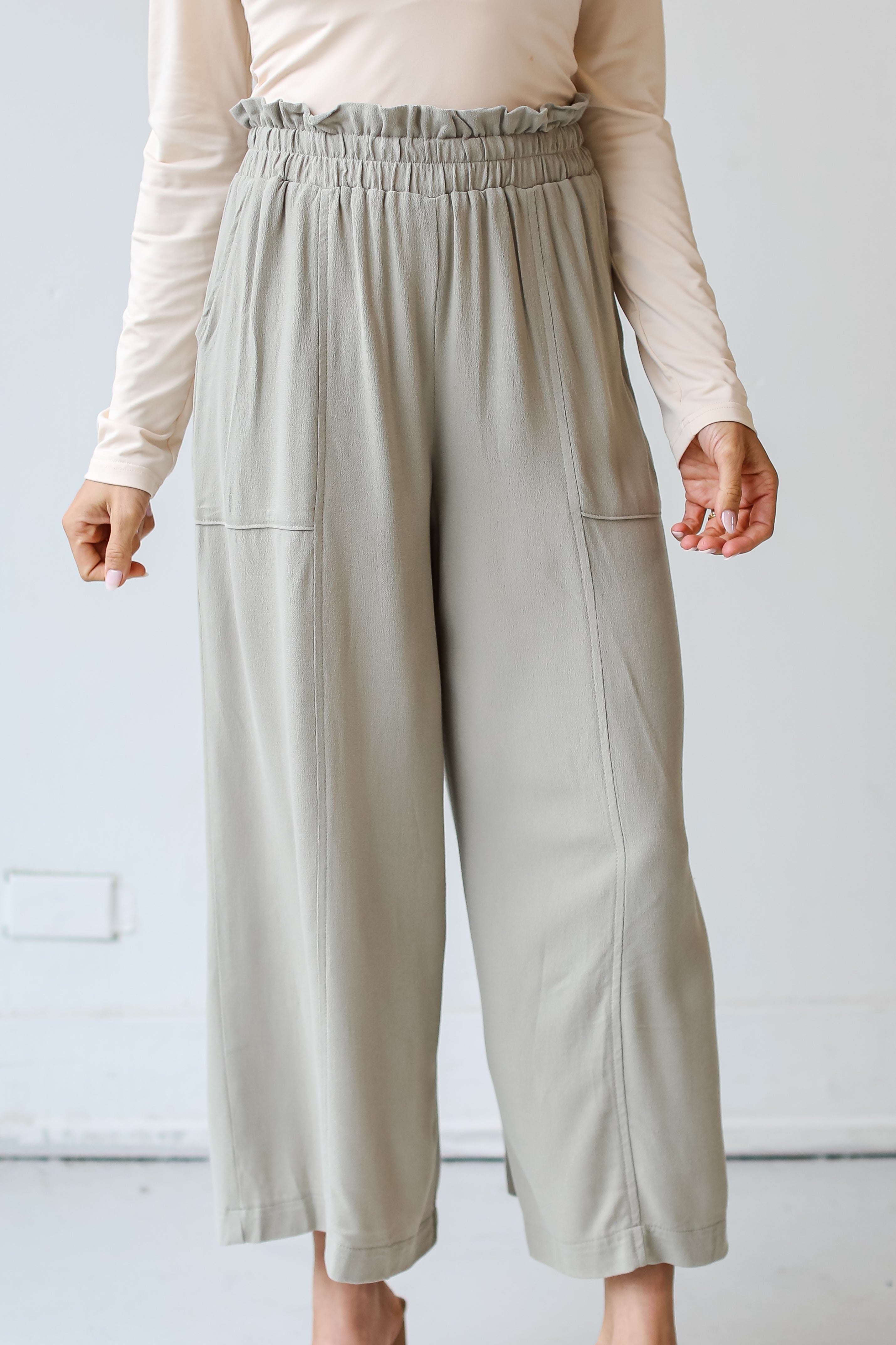 close up view of sage Paperbag Waist Pants