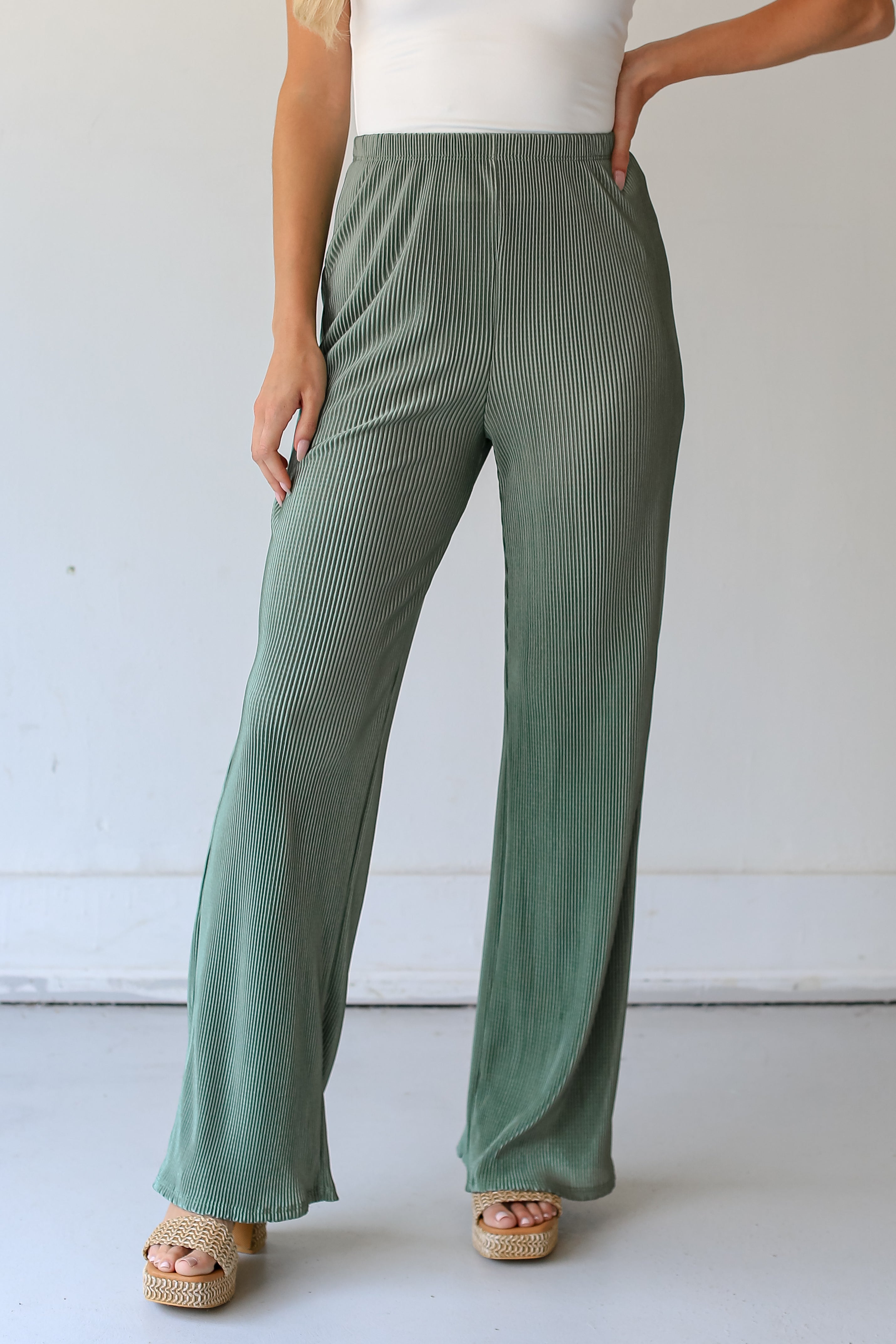 sage Plisse Satin Pants on dress up model