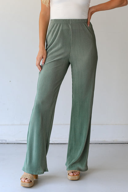 sage Plisse Satin Pants on dress up model