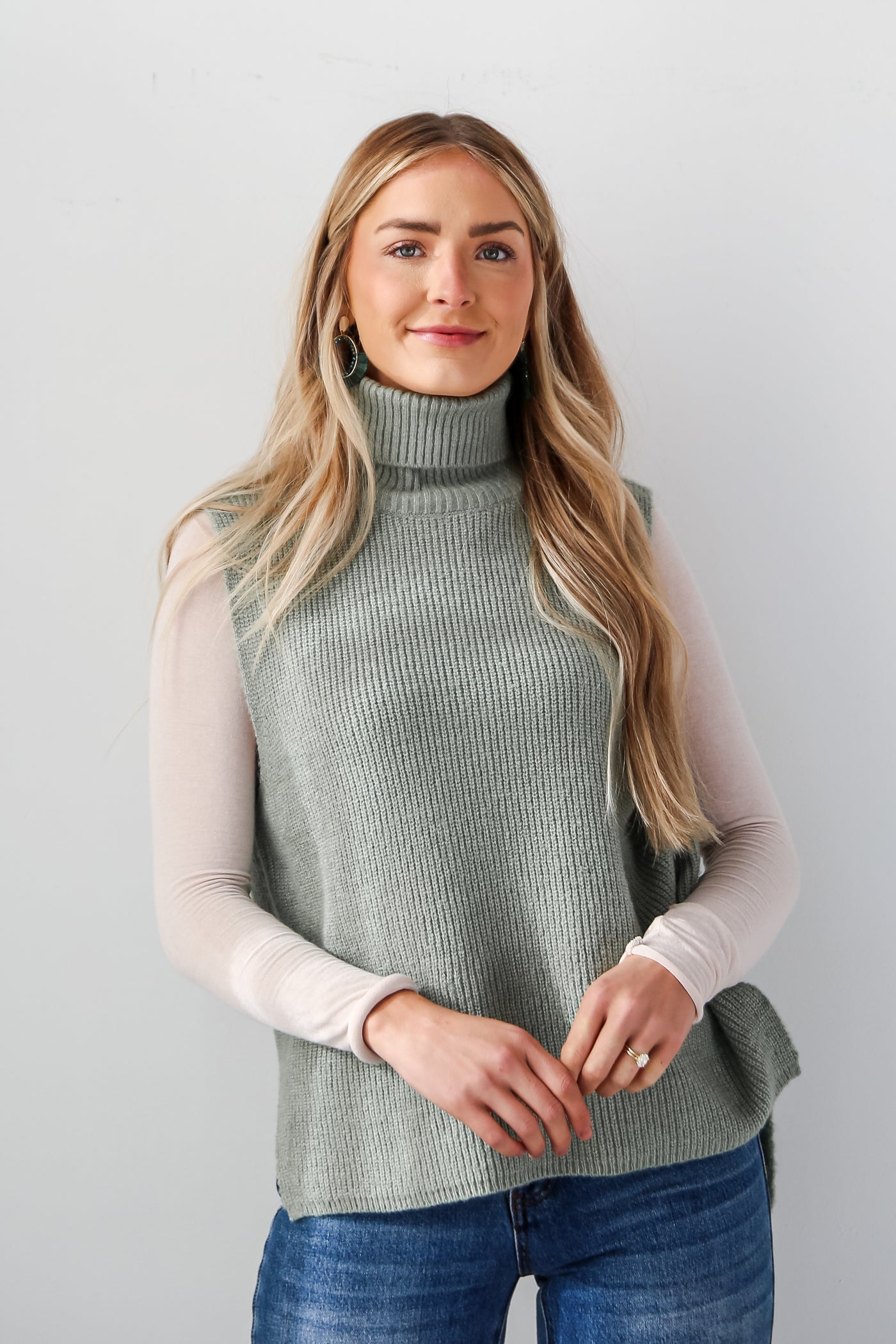 model wearing a Sage Turtleneck Sweater Tank