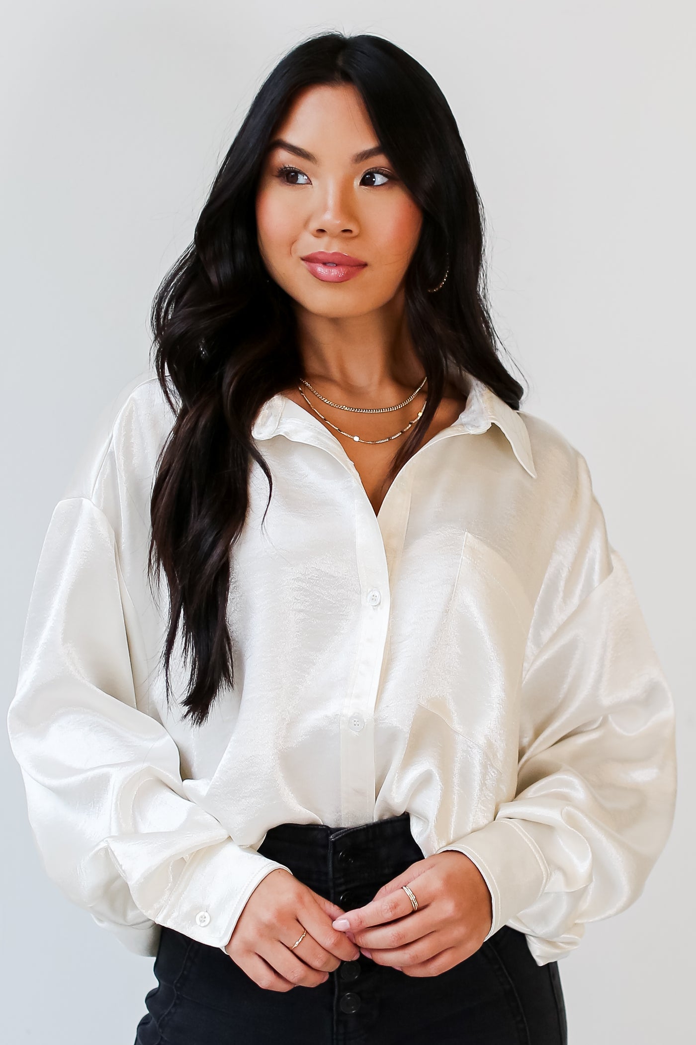 ivory Satin Button-Up Blouse tucked in