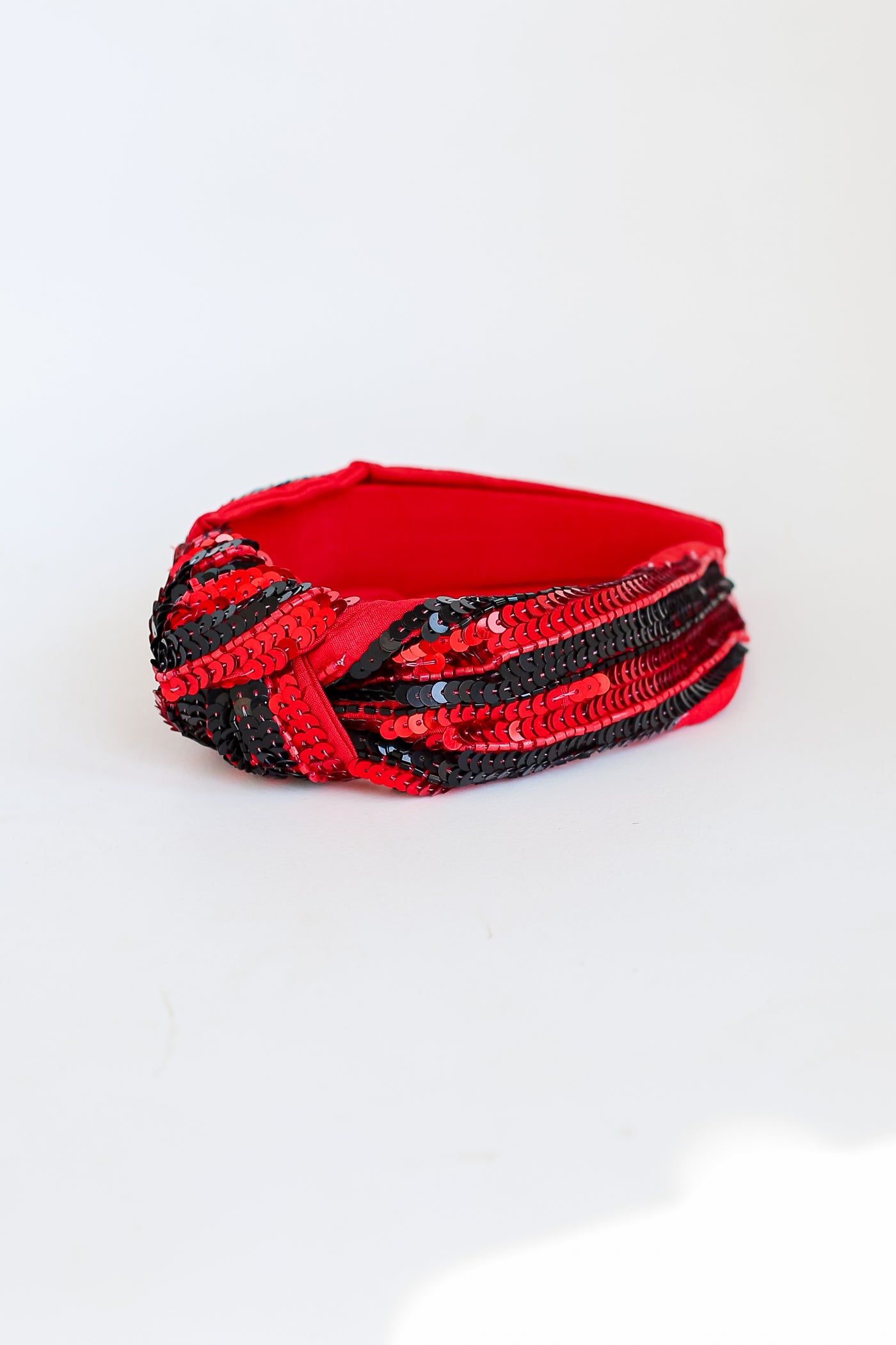 Red + Black Sequin Knotted Headband flat lay side view
