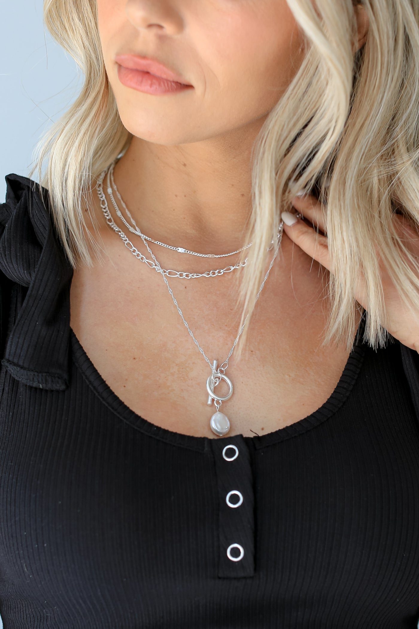 silver Layered Pearl Charm Necklace on model