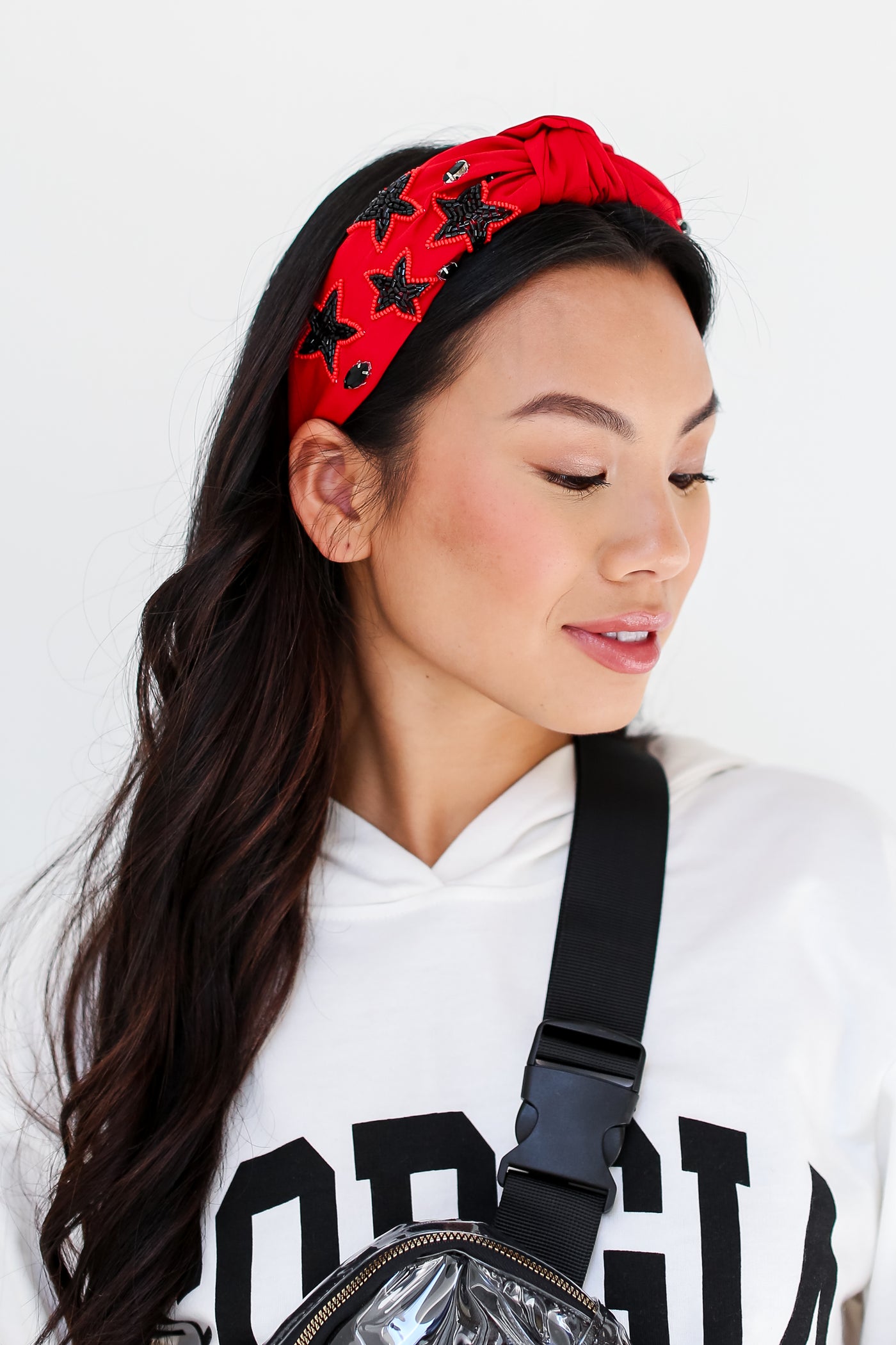 Red + Black Star + Gemstone Knotted Headband on dress up model