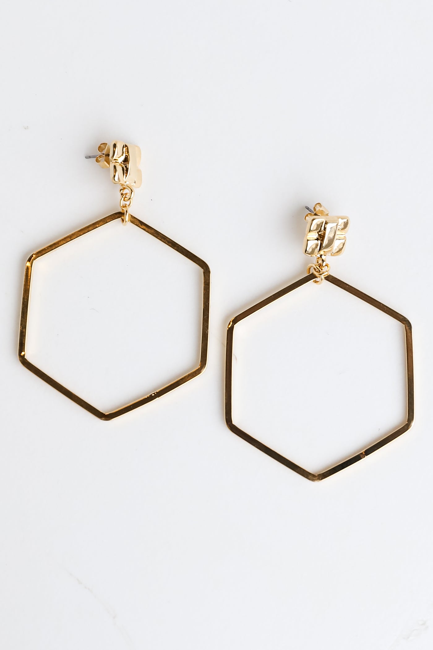 Gold Hexagon Drop Earrings flat lay