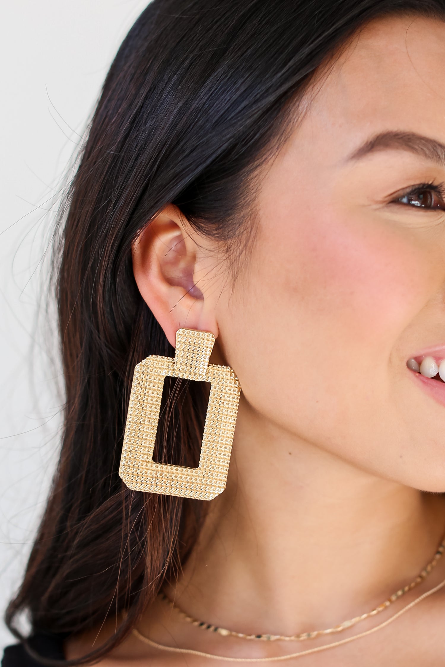 Gold Statement Earrings on dress up model