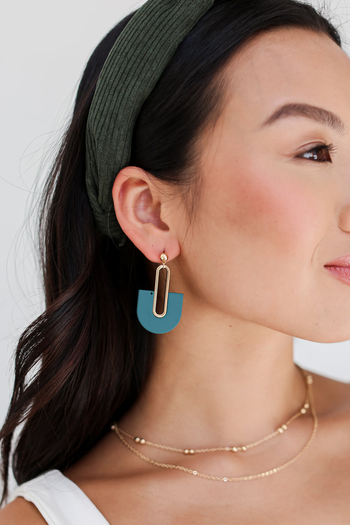 blue Acrylic Statement Earrings on dress up model