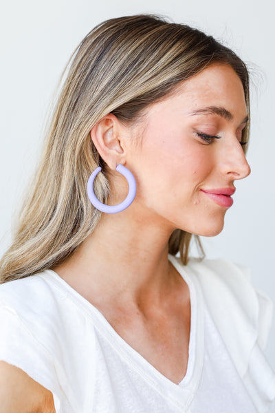 purple Matte Hoop Earrings on model