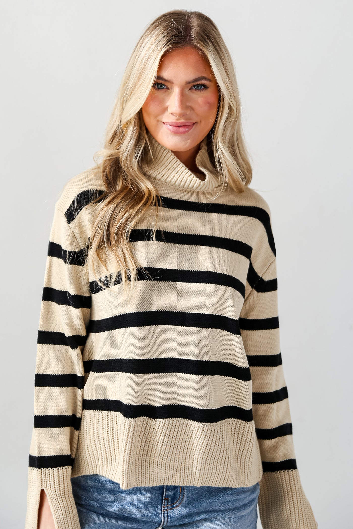 Taupe Striped Turtleneck Sweater on model