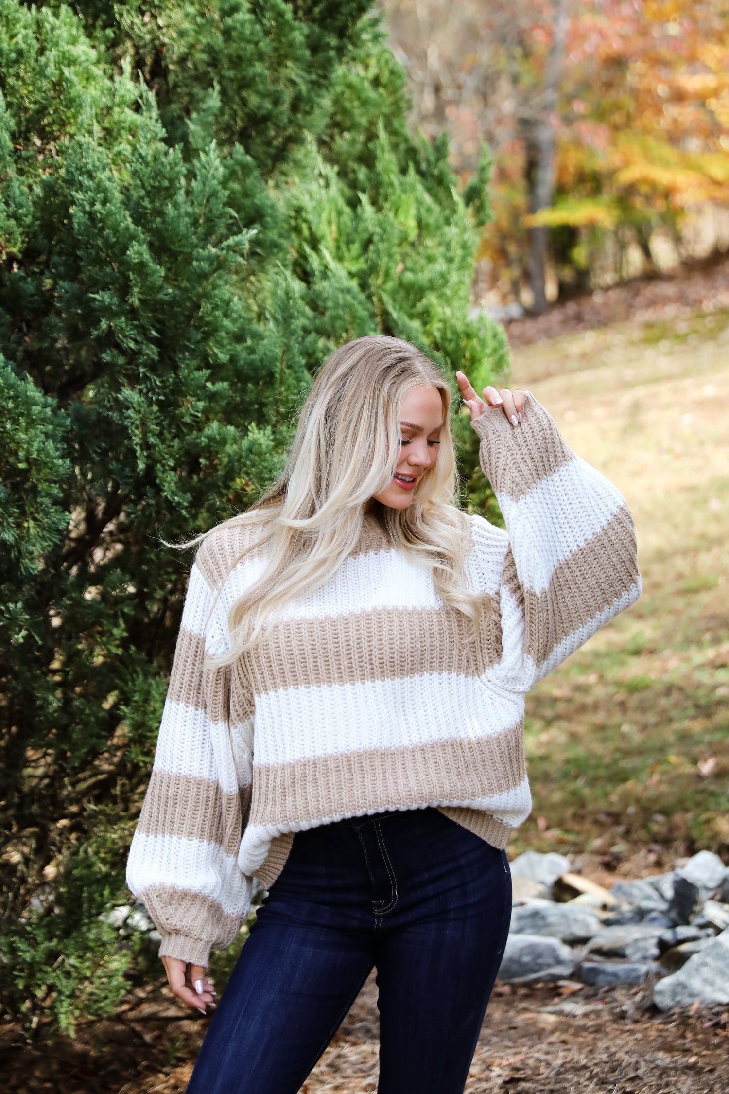 https://shopdressup.com/cdn/shop/files/shopdressup_taupe_striped_oversized_sweater-7.jpg?v=1736364213&width=1500&utm_source=chatgpt.com
