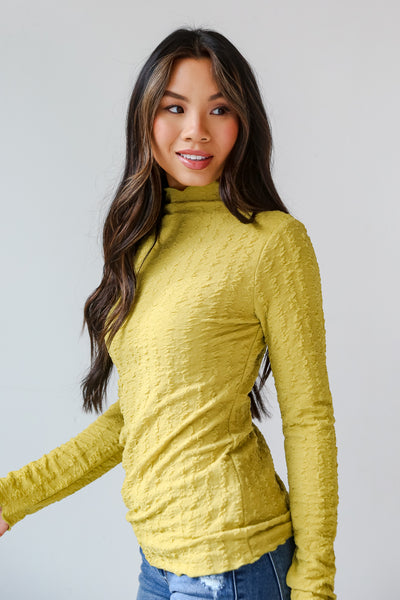 green Textured Mock Neck Top side view