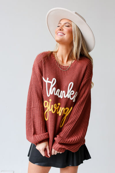 Rust Thanksgiving Sweater on model