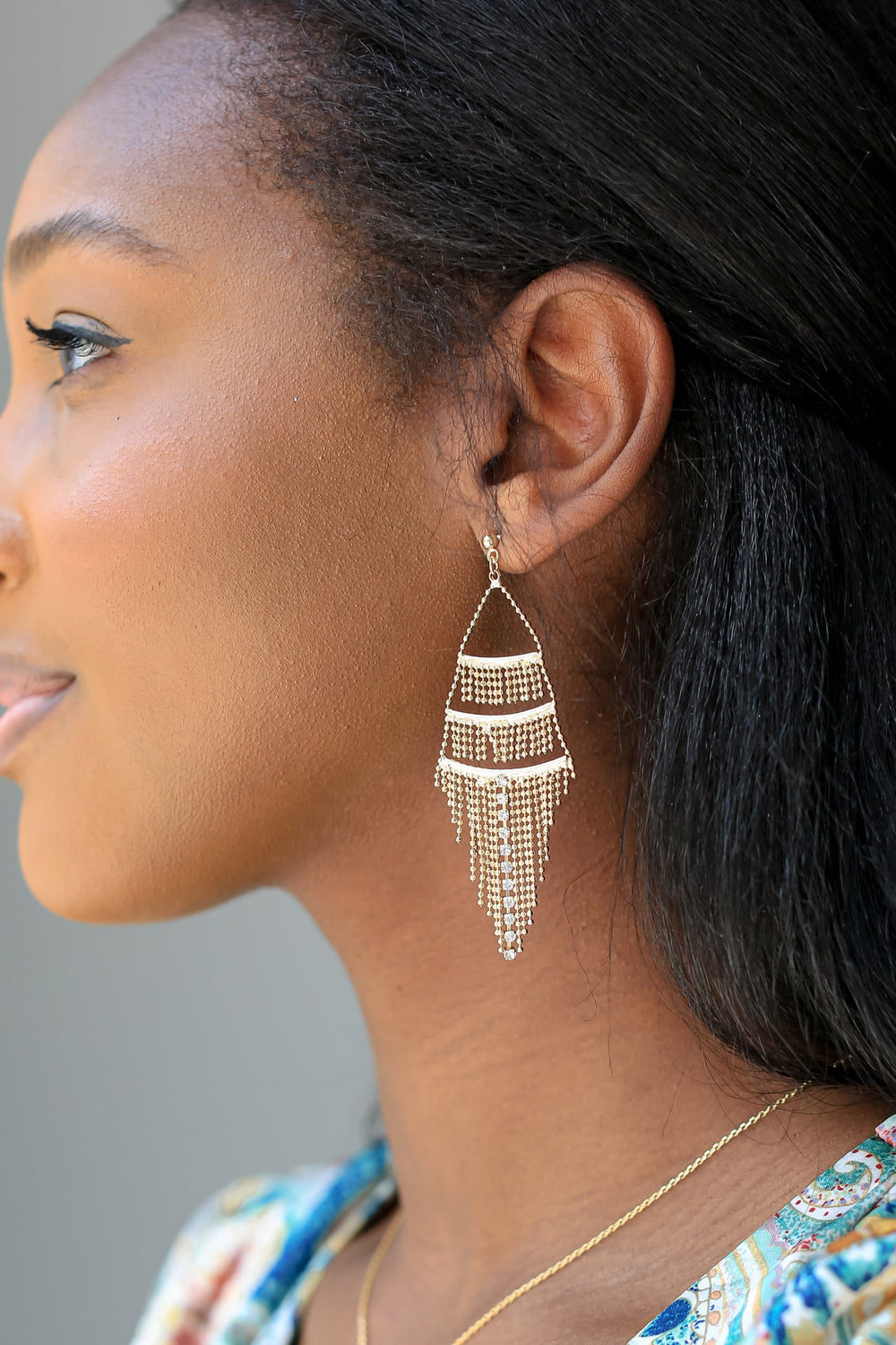 Gold Tiered Fringe Drop Earrings on model
