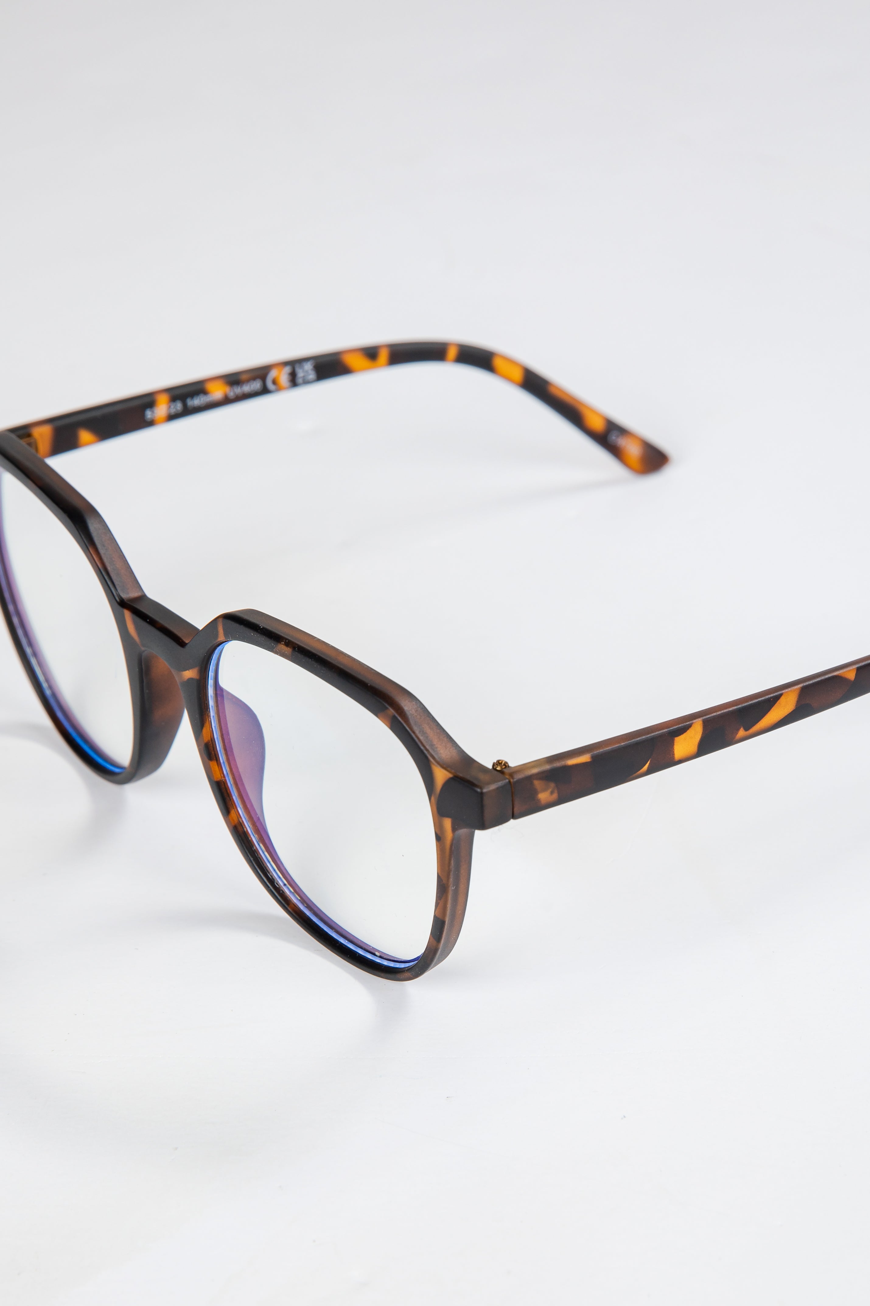 Tortoiseshell eyeglasses on a white background