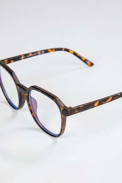 Tortoiseshell eyeglasses on a white background