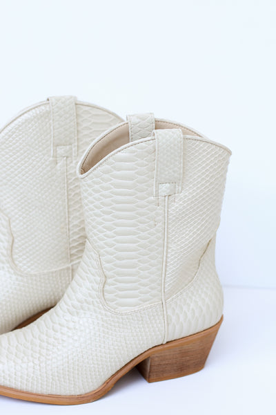 ivory snakeskin Western Booties close up
