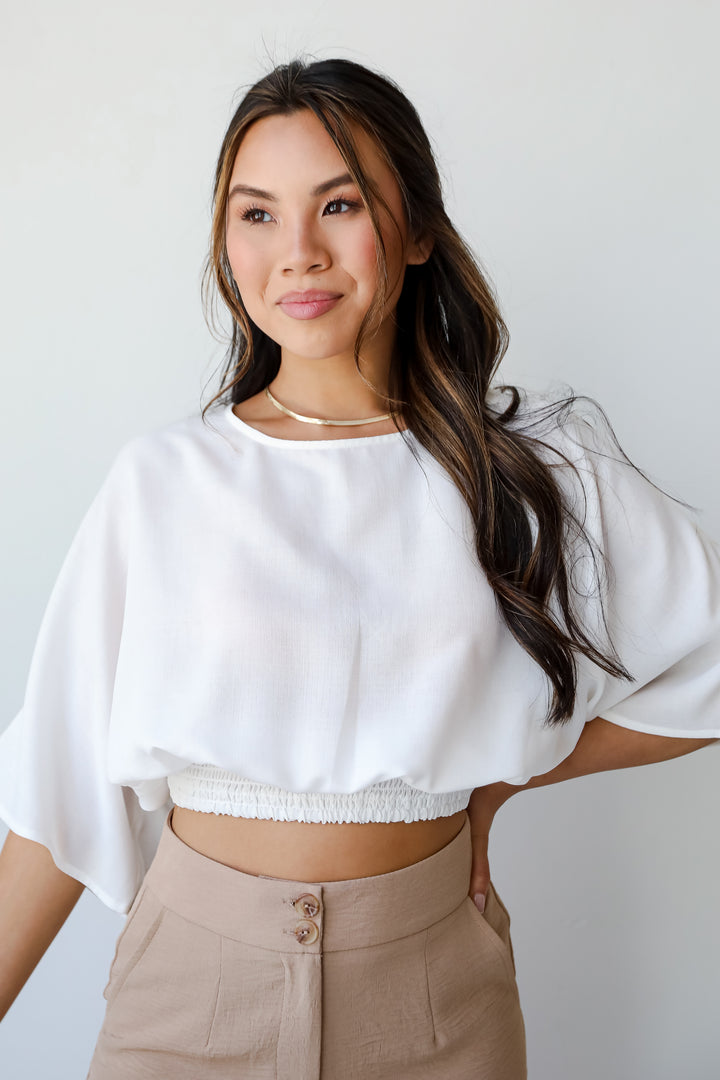 white cropped blouse