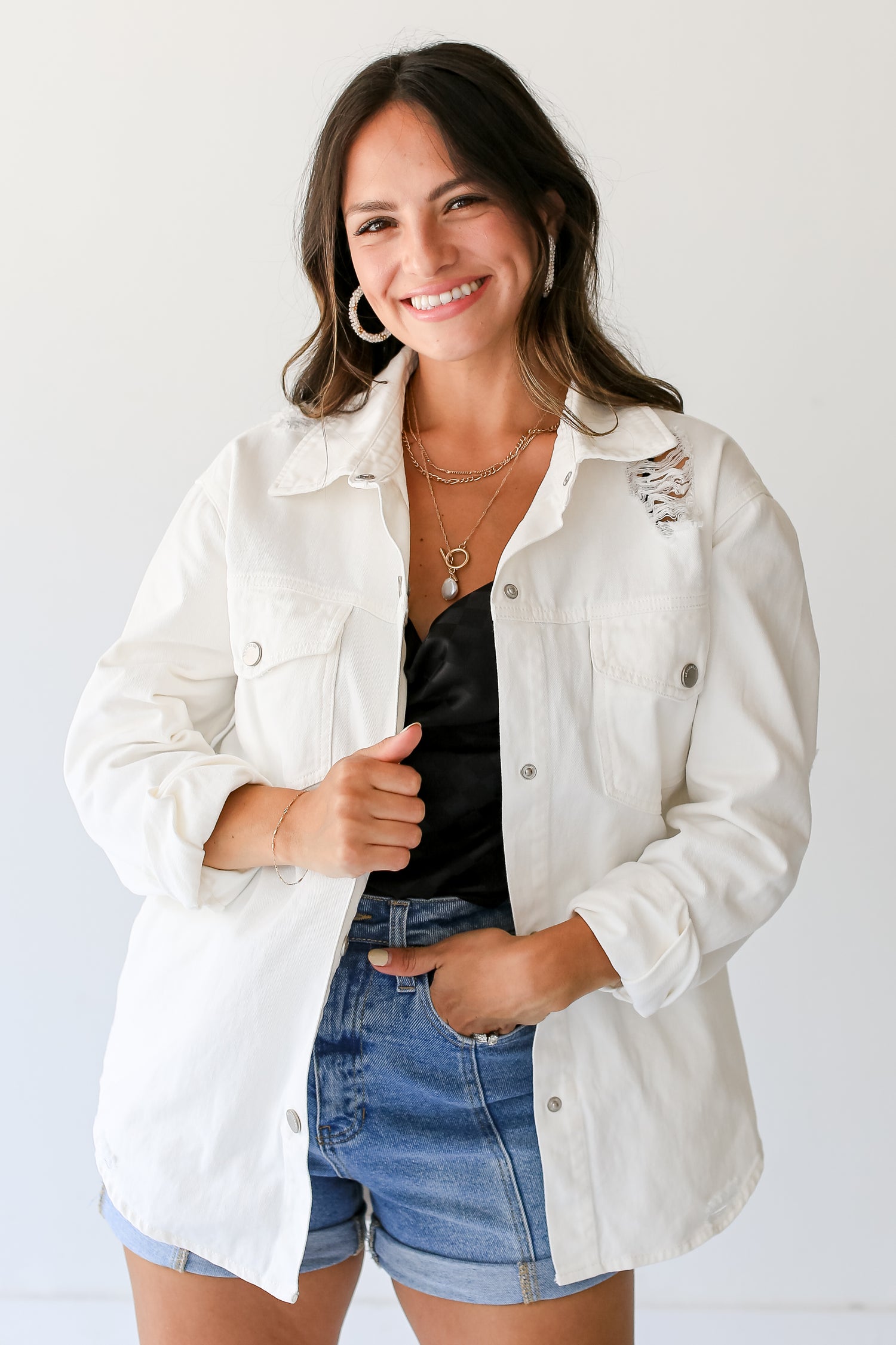 White Distressed Denim Jacket on model