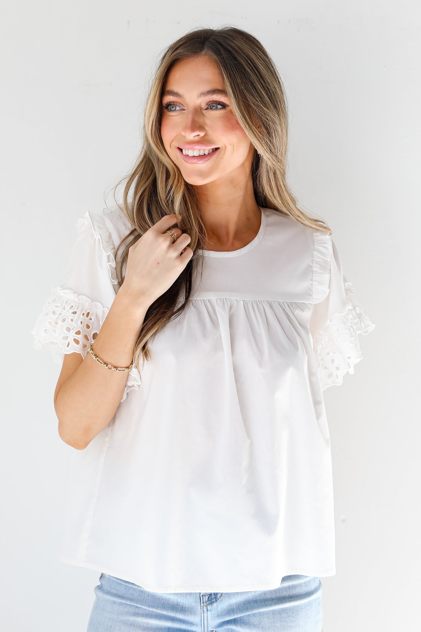 white Eyelet Sleeve Blouse front view on model