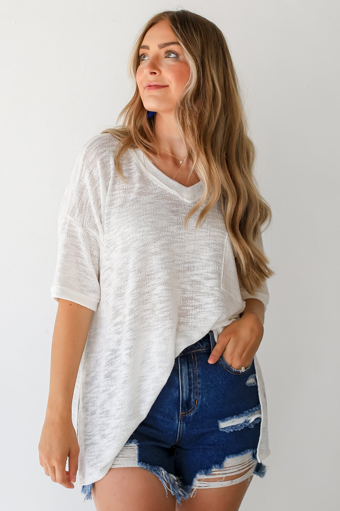 white Knit Top tucked in