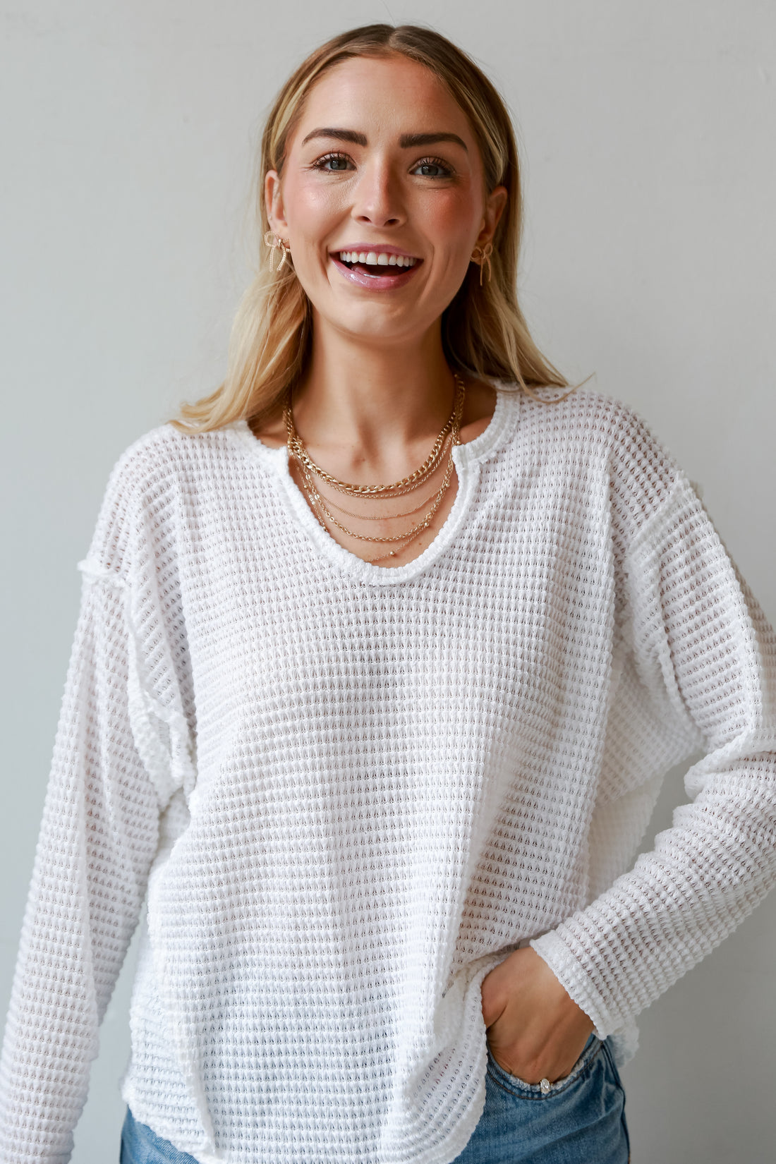 white long sleeve top