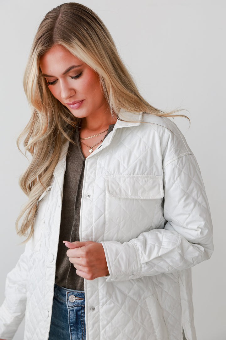 White Quilted Puffer Jacket front view