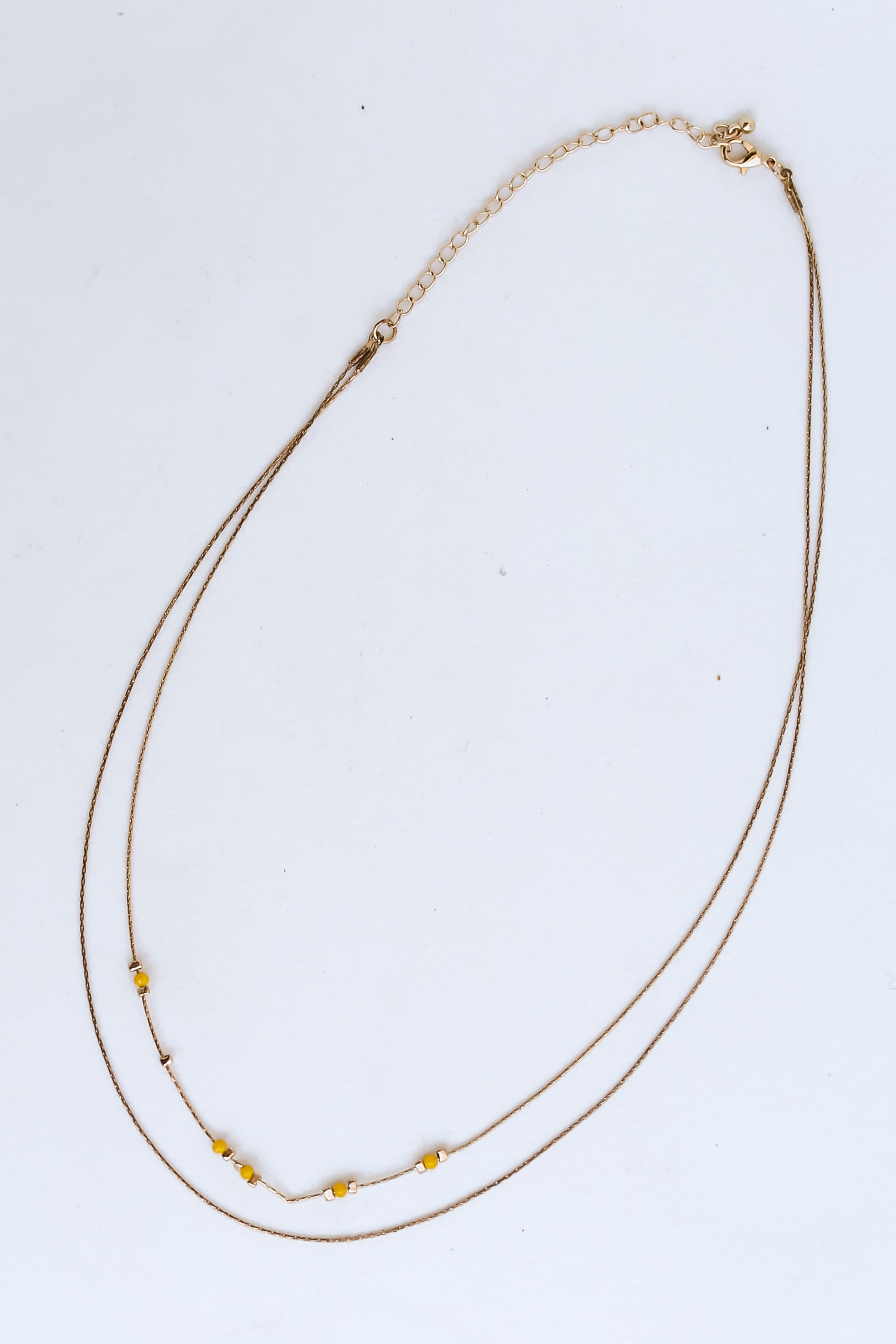 Gold Layered Necklace flat lay