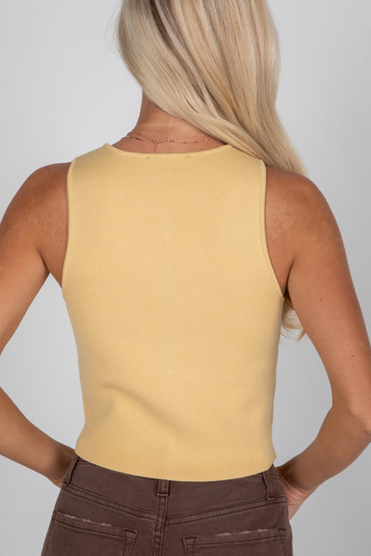 yellow knit vest
