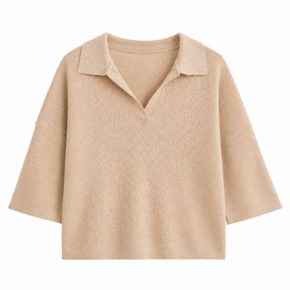 A beige ribbed knit polo sweater with a wide collar and three-quarter sleeves, shown against a plain white background.