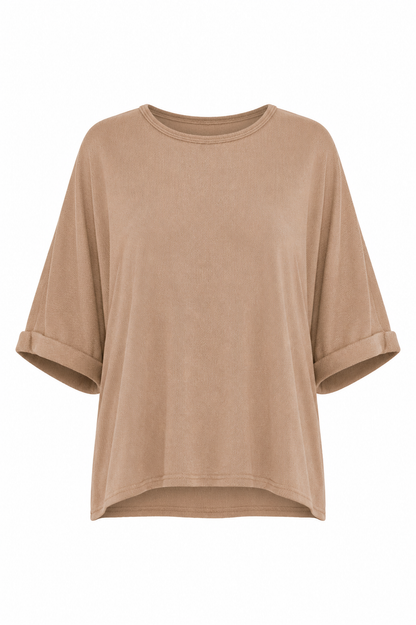 A loose-fitting short-sleeve t-shirt in a warm tan or camel color, featuring rolled cuffs and a relaxed silhouette, shown against a plain white background.