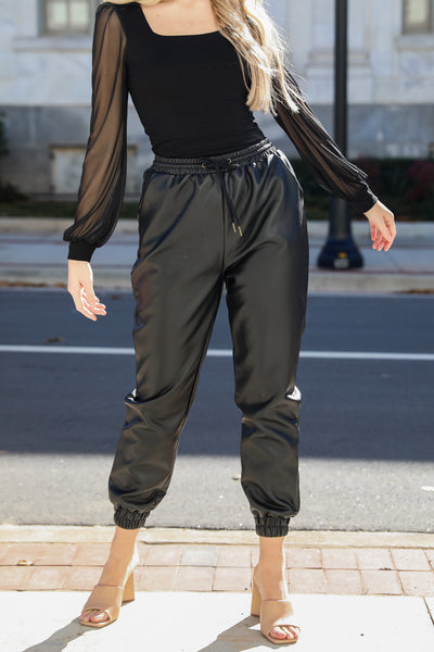 black Leather Joggers on model