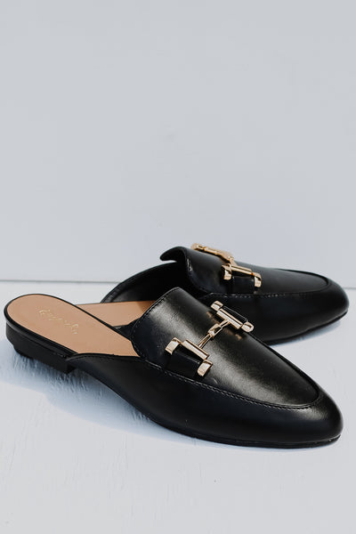 black faux leather loafers with gold buckle and chic slide fit