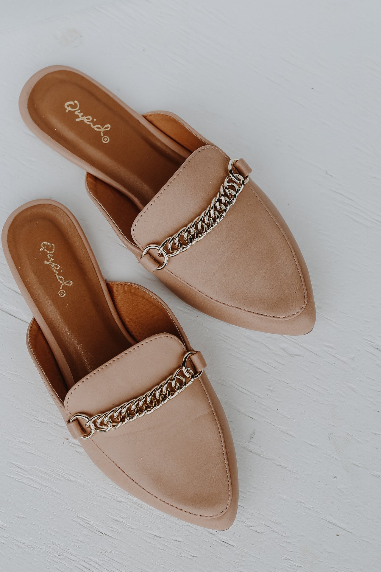 cognac camel tan leather pointed toe slide loafers with gold chain detail