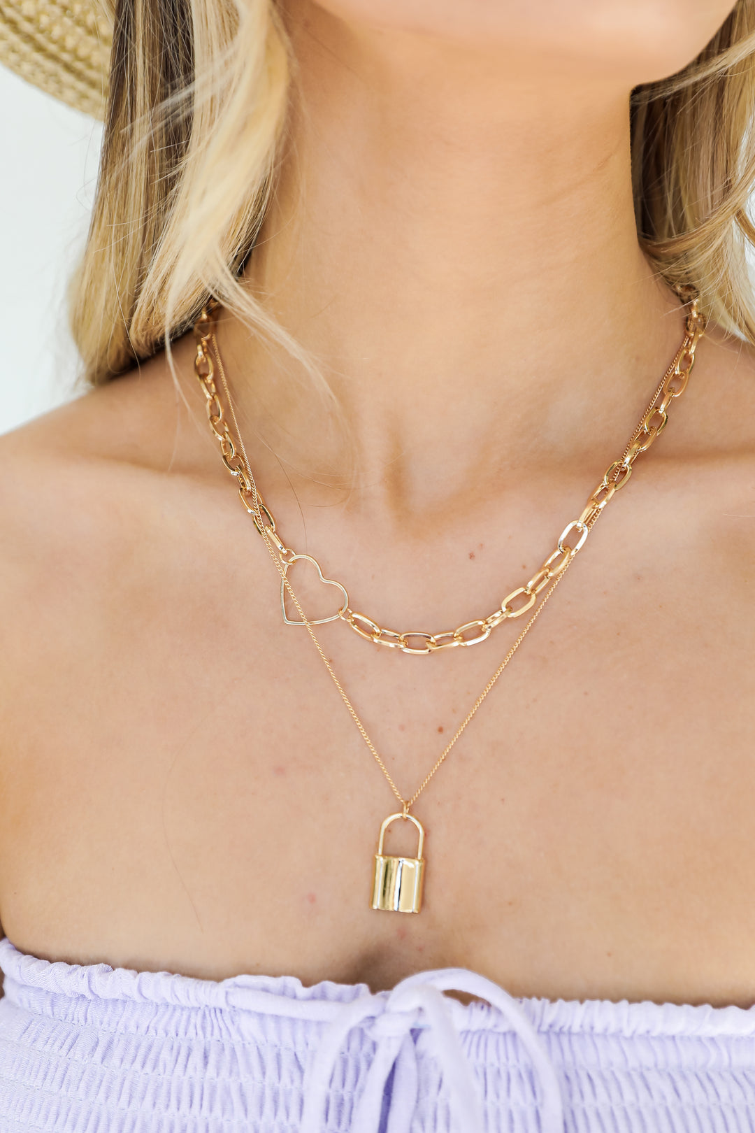 Gold Heart + Lock Layered Necklace on model
