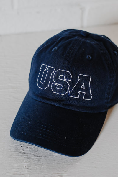 USA Baseball Hat in navy flat lay