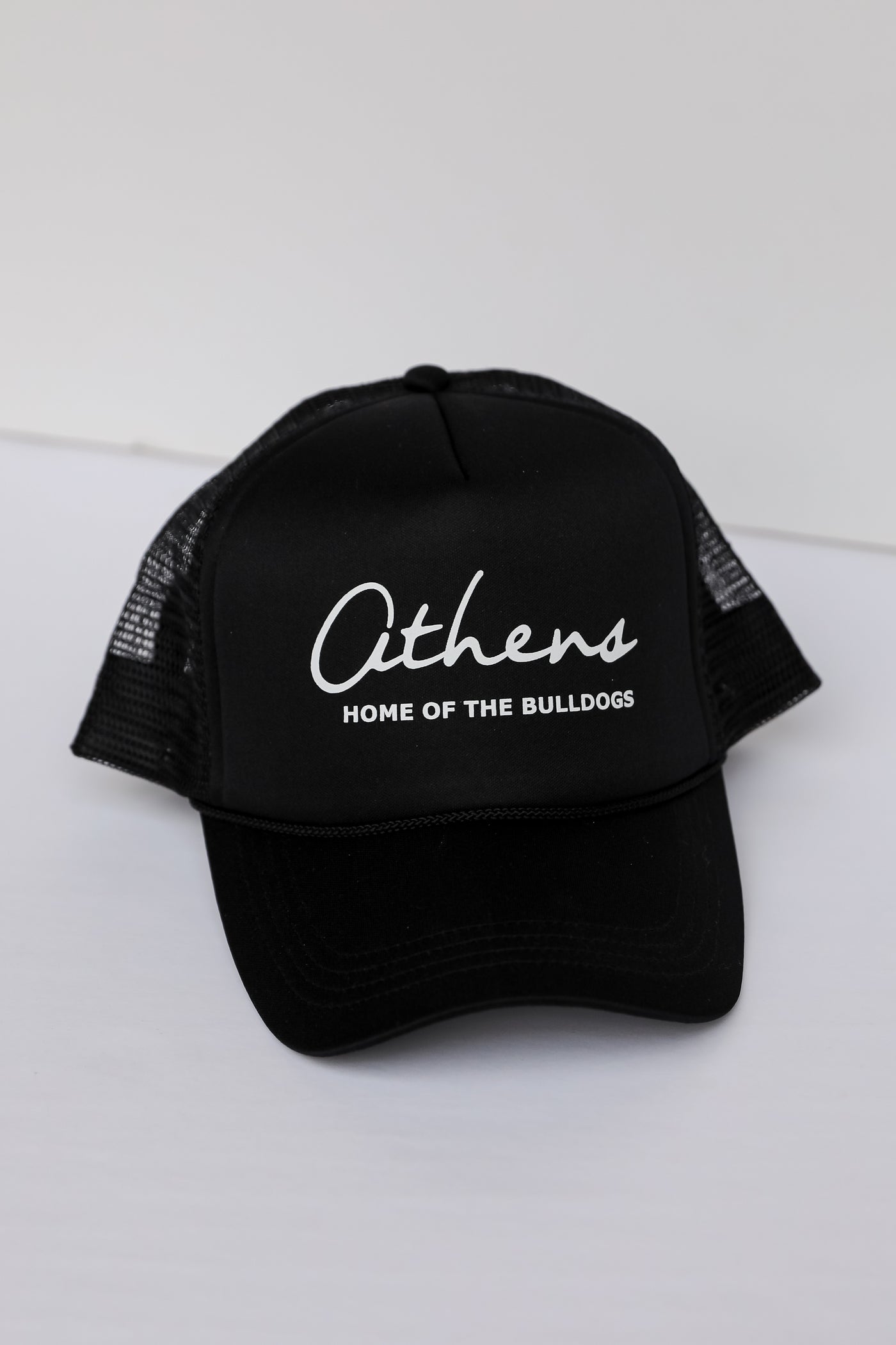 black Athens Home Of The Bulldogs Trucker Hat flat lay