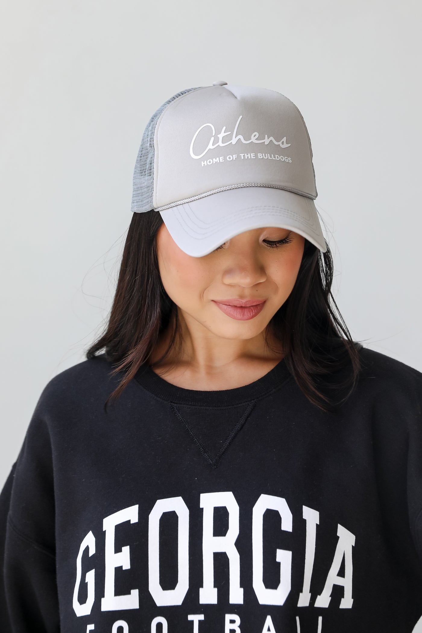 grey Athens Home Of The Bulldogs Trucker Hat on model