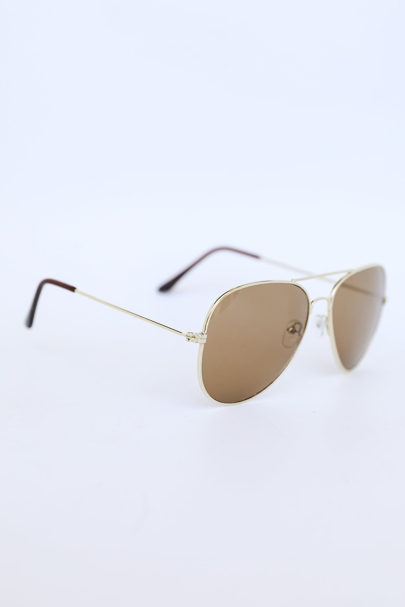 Gold Aviator Sunglasses flat lay