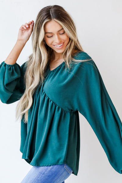 Babydoll Blouse in hunter green side view