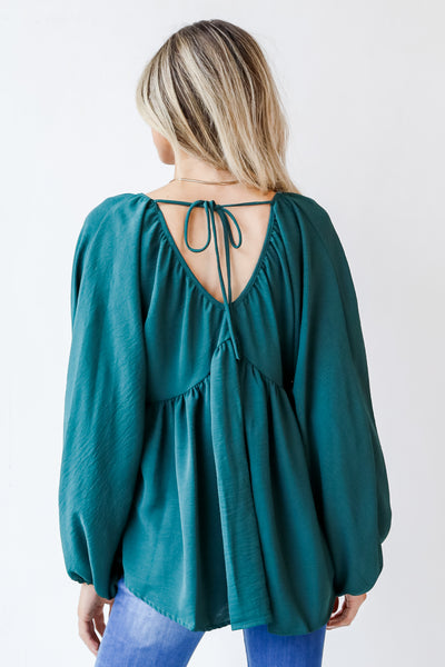 Babydoll Blouse in hunter green back view