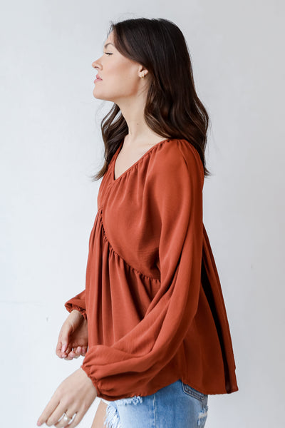 Babydoll Blouse in rust side view