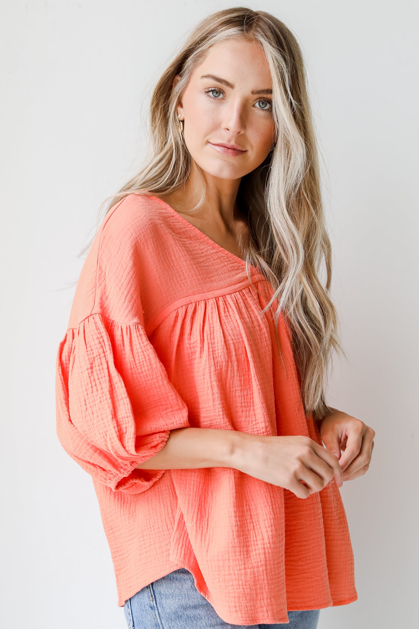Linen Babydoll Blouse in coral side view