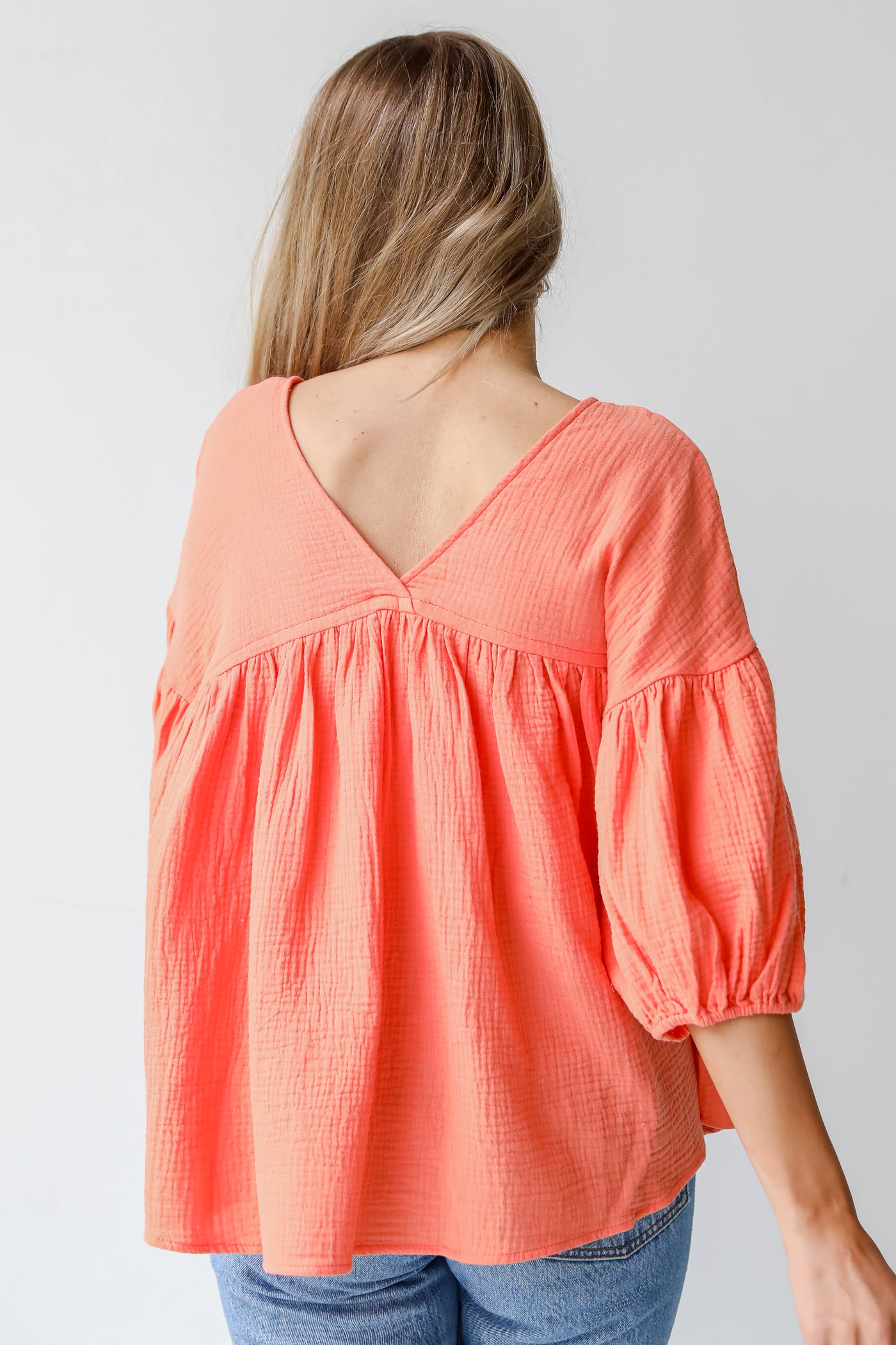 Linen Babydoll Blouse in coral back view