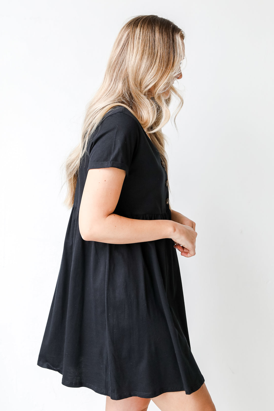 Button Front Babydoll Dress in black side view