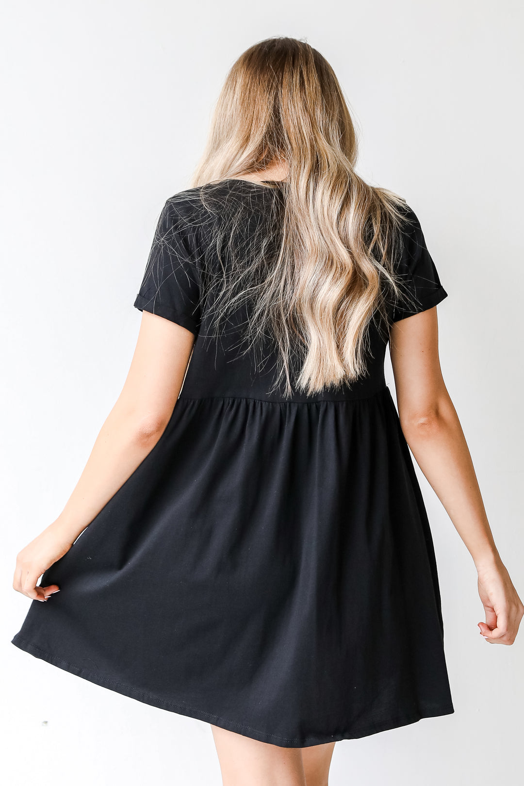Button Front Babydoll Dress in black back view