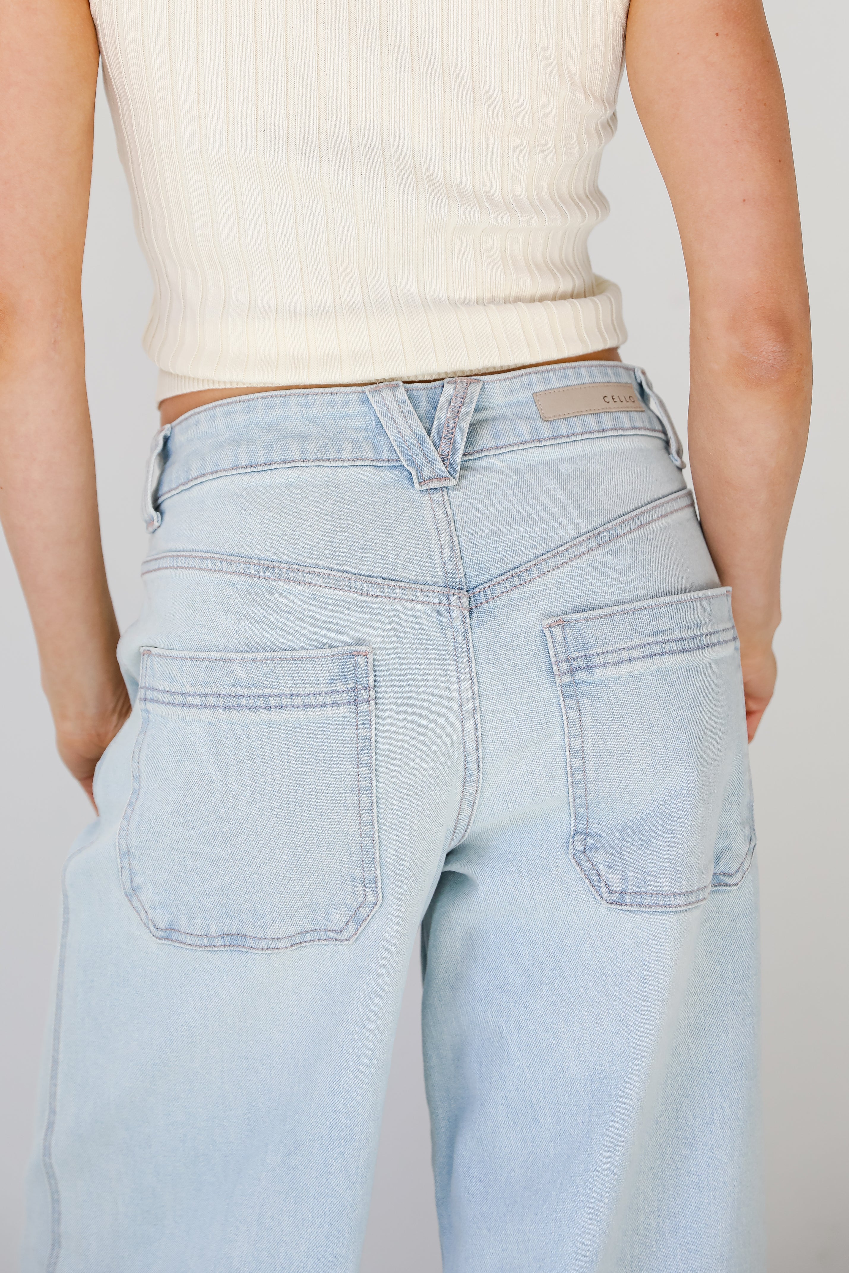 light wash baggy skater jeans back view close up