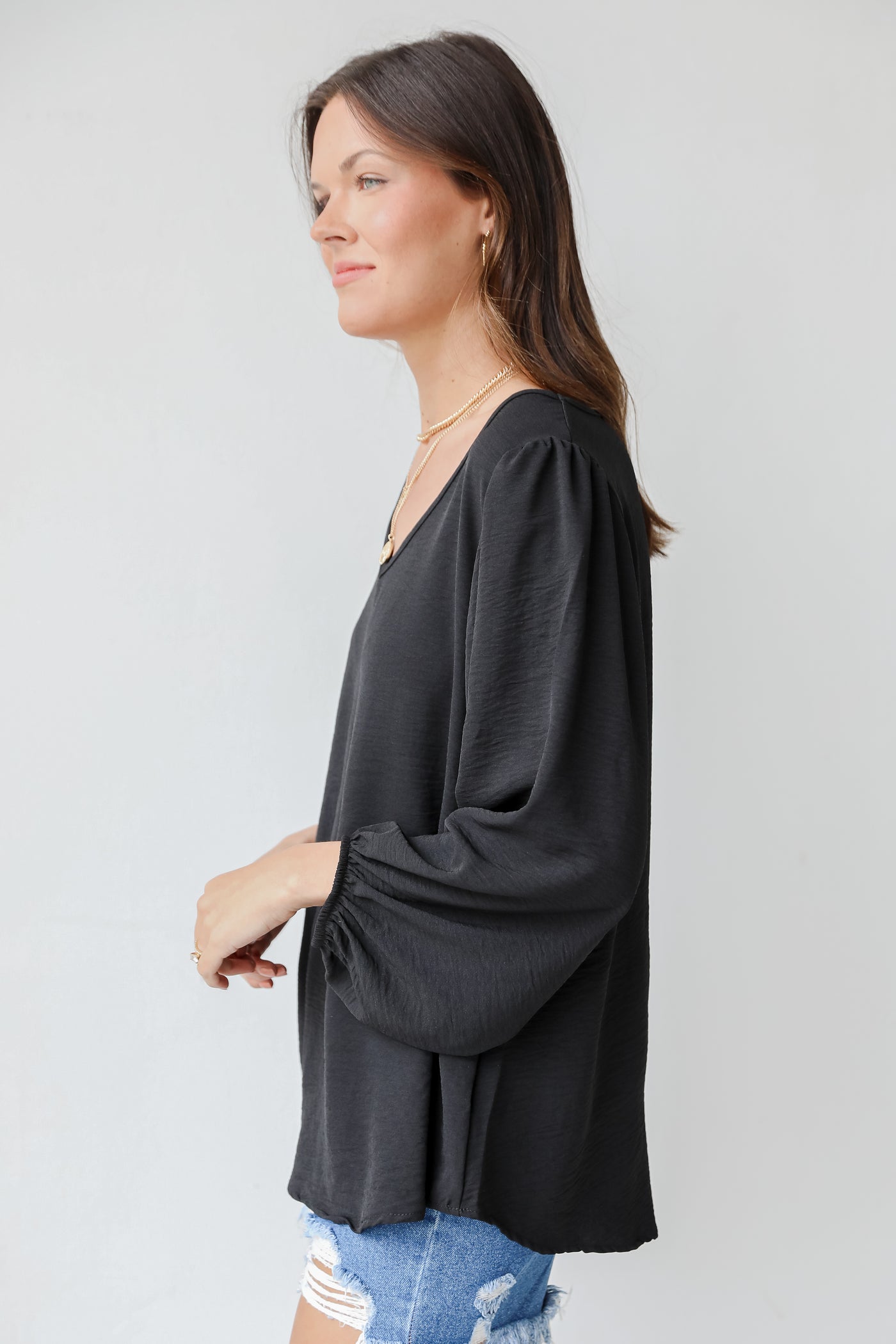 Blouse in black side view