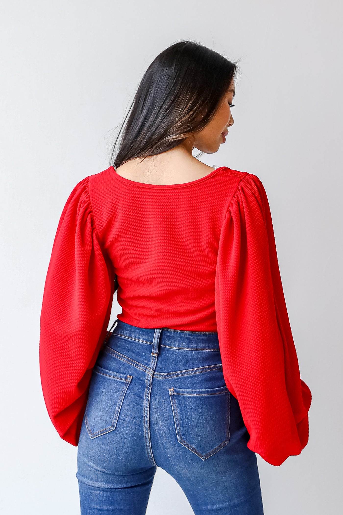 Blouse in red back view